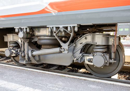 Train wheel and truck with dampening system